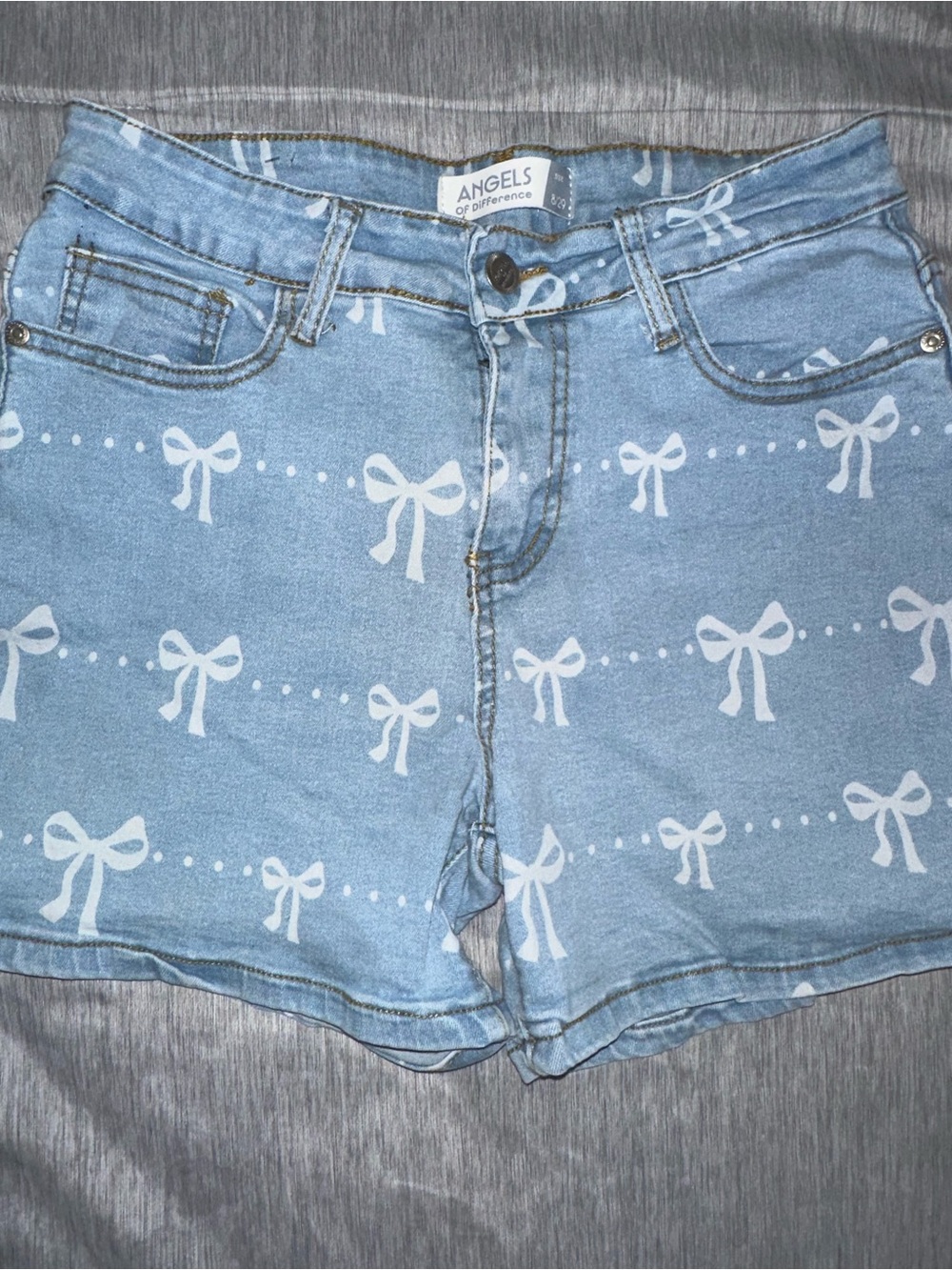 Angels Light Blue Denim Shorts with White Bow Pattern